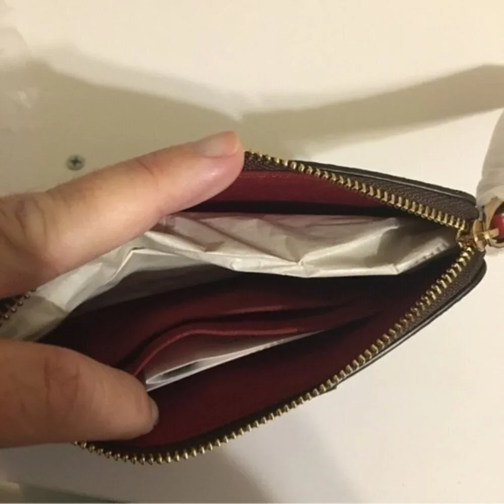 Coach signature coated canvas wristlet